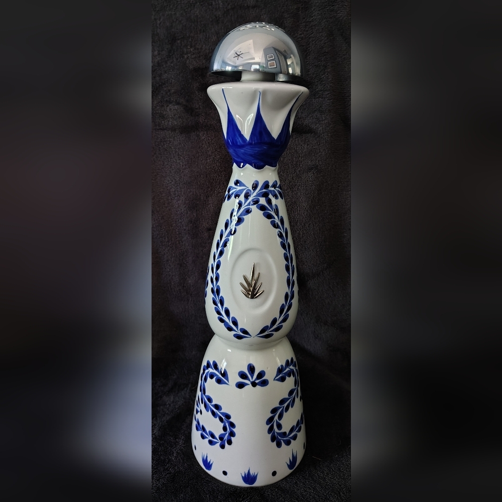 Hand-Painted Blue and White Ceramic Decorative Bottle with Silver Top